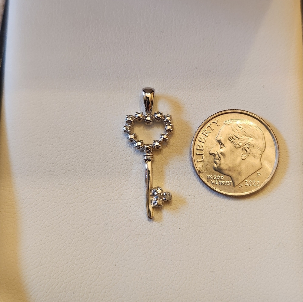 Silver key pendant
